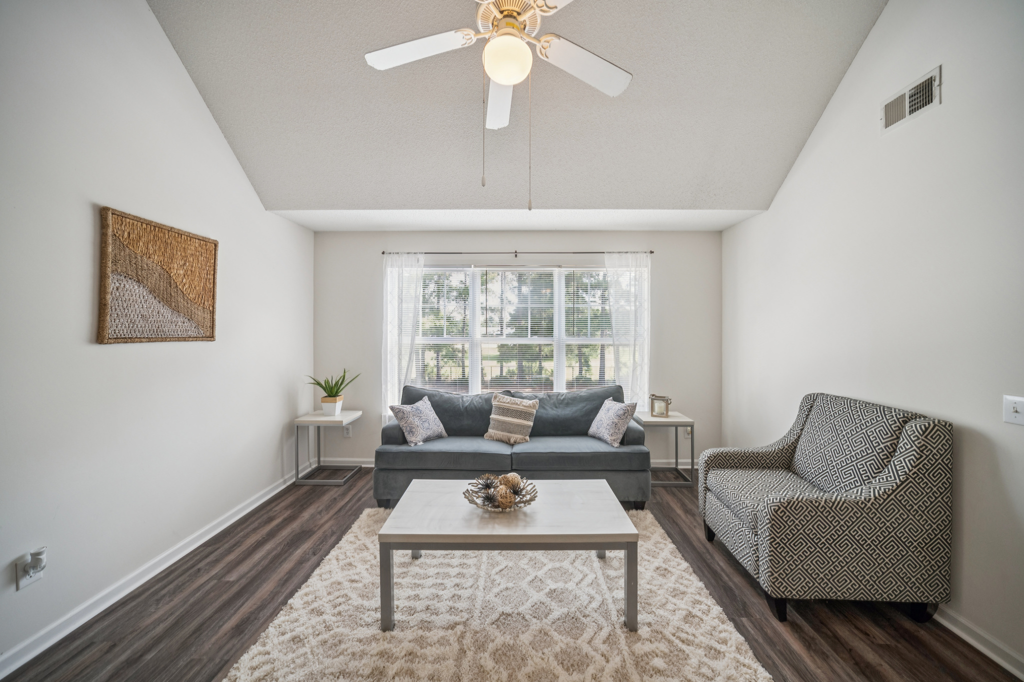 a living room with a couch and a coffee table
