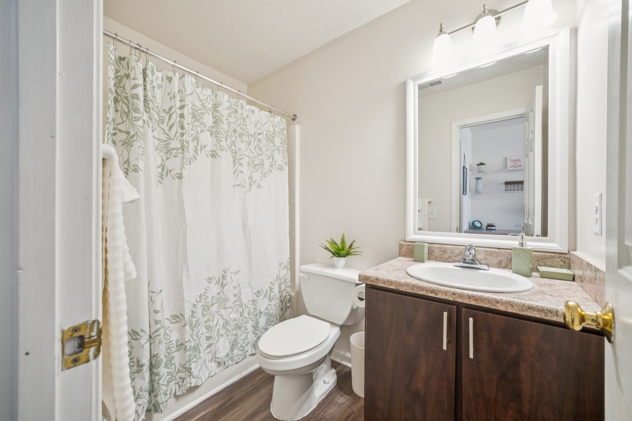 a bathroom with a sink and toilet