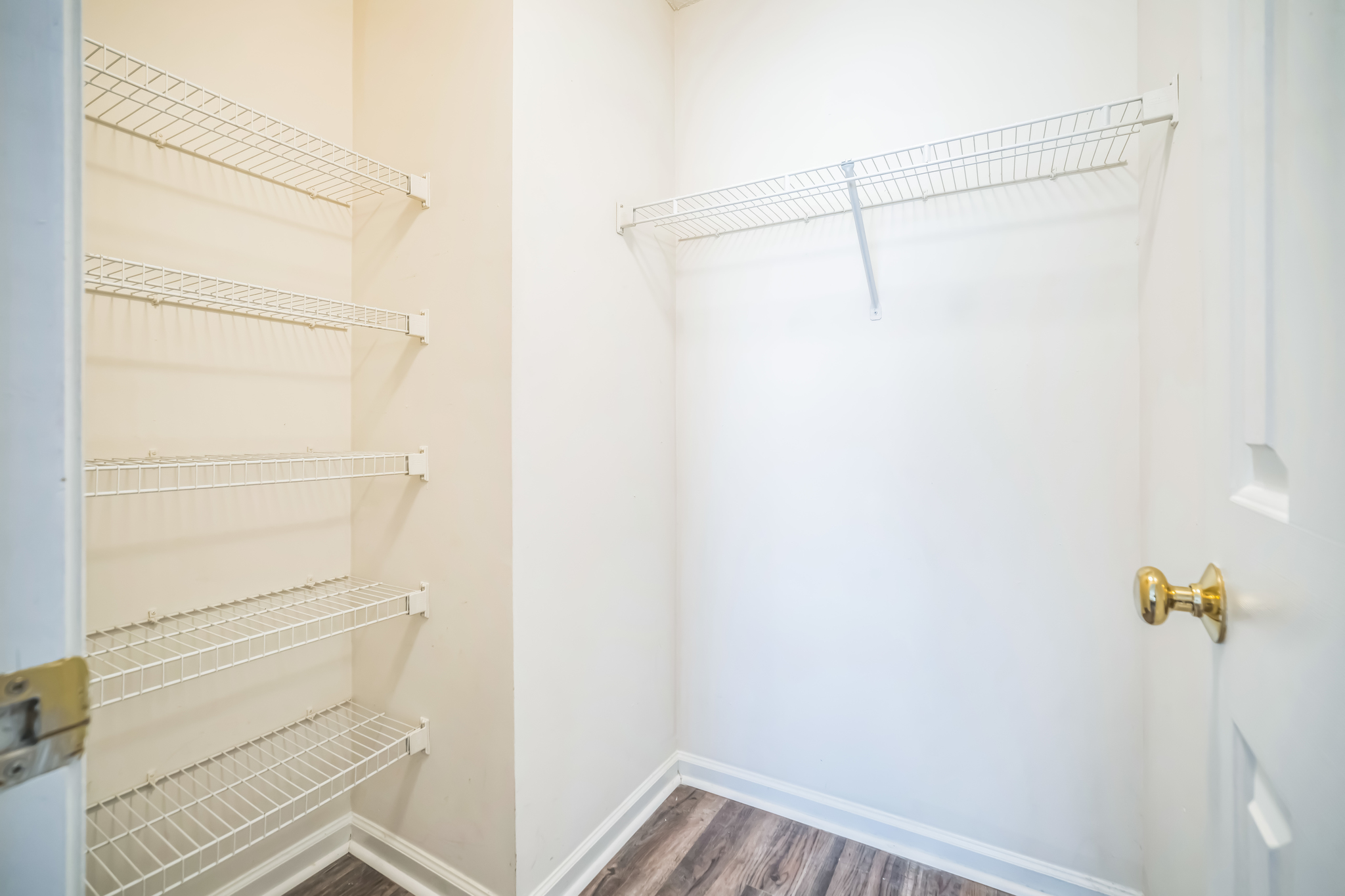 a empty closet with shelves